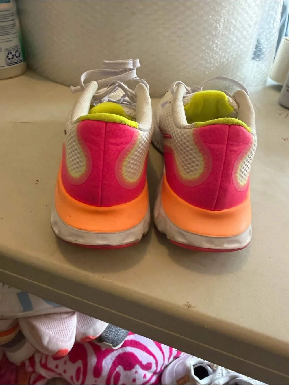 Nike women’s size 7 Renew Running Shoe pink orange yellow